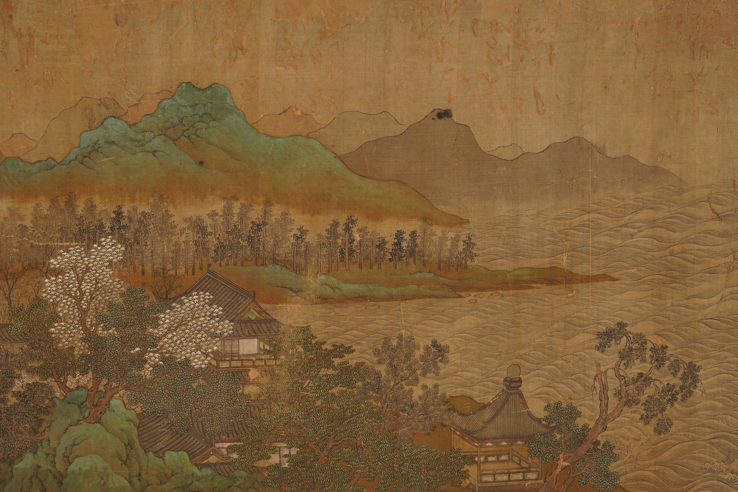 Chinese School , 17th century or earlier, Scholars in a mountainous river landscape scene with pavilions, Ink and colour on silk, incomplete clerical script signature, 54cm x 290cm